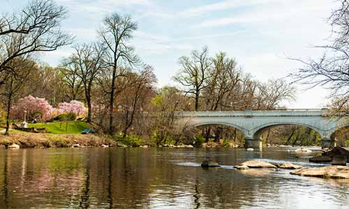 The Brandywine River flows beneath a historic Wilmington bridge at Wilmington State Parks
